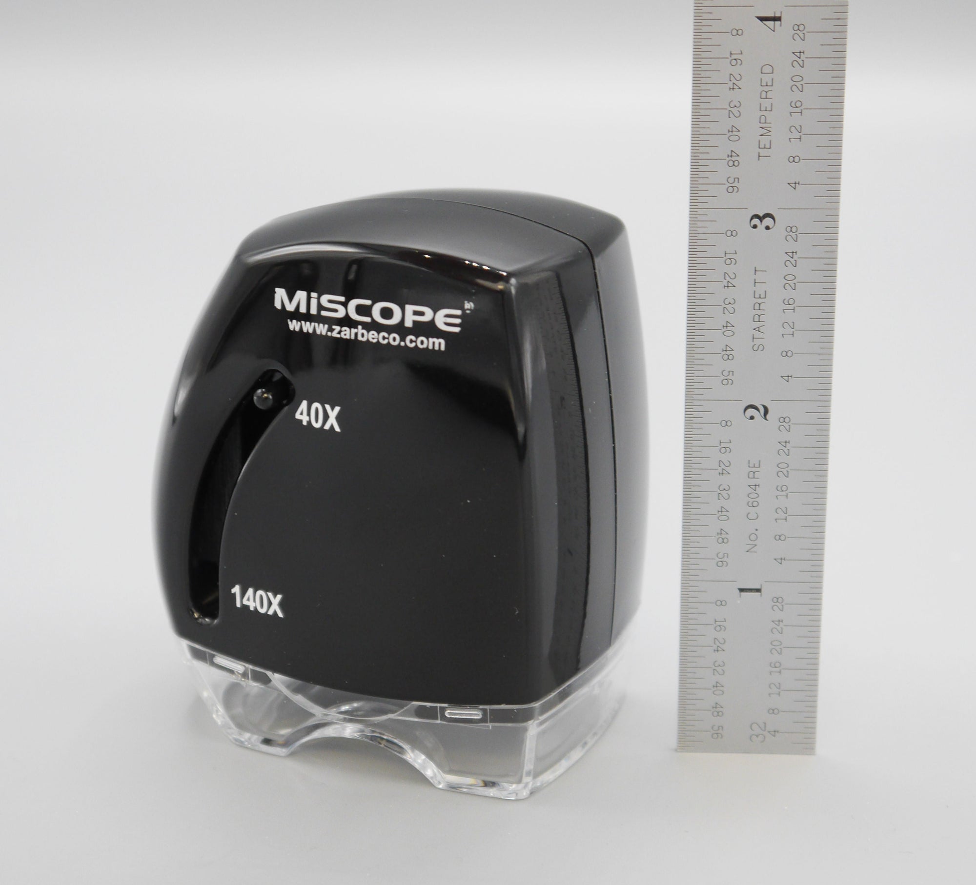 MiScope next to ruler showing 3 inches